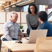 Office,Colleagues,Having,A,Discussion,Together,In,An,Office